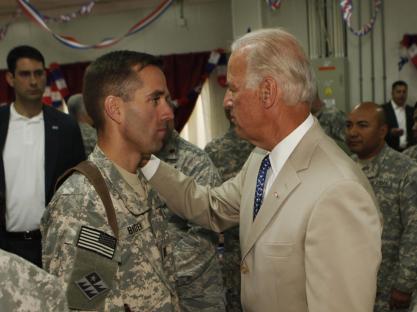 Joe Biden speaking with his son, Beau Biden, in Iraq.