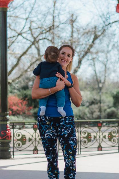 Sarah Campus holding her child.