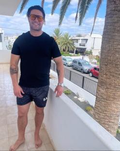 Tony Discipline, EastEnders actor, on a balcony.