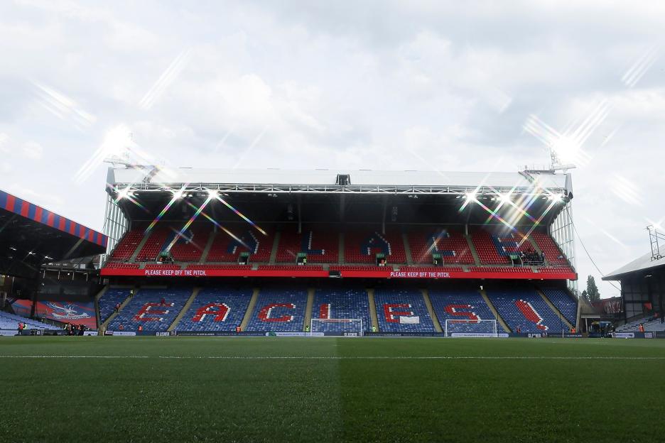 Selhurst Park stadium, "Eagles" visible in seating.