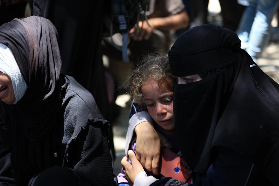 Israeli tanks ‘open fire into crowd trying to get food from aid trucks in Gaza killing dozens’ as IDF launches probe