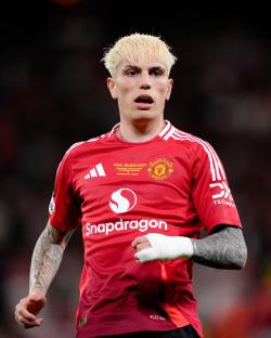 Alejandro Garnacho of Manchester United in a red jersey.