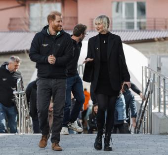 Prince Harry and Olga Rudneva walking in Lviv, Ukraine.