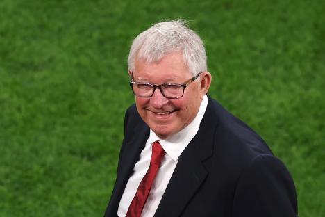 Sir Alex Ferguson smiling.
