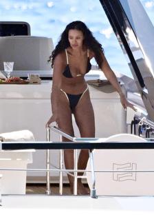 Maya Jama in a bikini on a yacht.