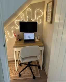 Cozy home office under the stairs.