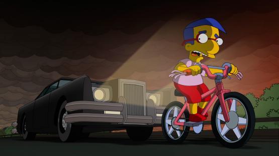 Illustration of Millhouse Van Houten riding a bicycle past a car at night.