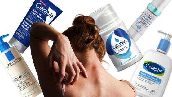 Woman scratching her back with various skincare products surrounding her.