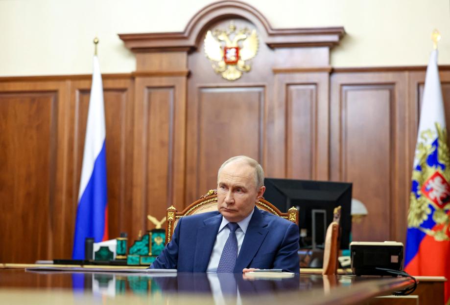 Vladimir Putin at a meeting.