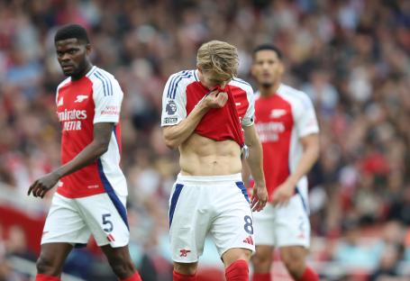 Martin Odegaard of Arsenal looking disappointed during a match.