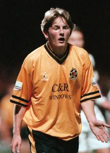 Tom Youngs of Cambridge United in action during a soccer match.