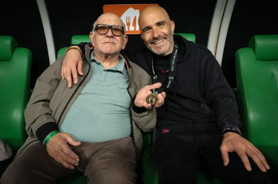 Maresca with his dad, Maresca holding a medal.