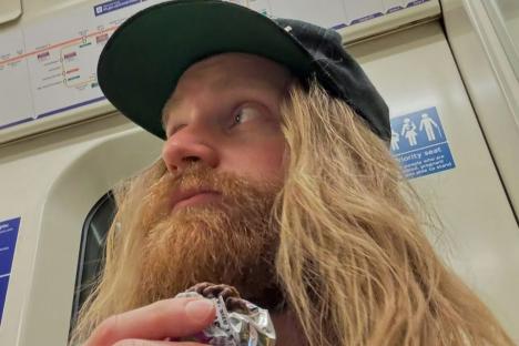 Millionaire pop star goes unnoticed by London commuters as he rides the tube – would you have spotted him?
