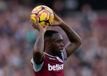 Aaron Wan-Bissaka of West Ham United FC holding a soccer ball.