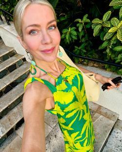 Woman in a green and yellow dress.