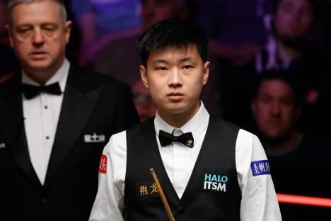 Disgraced snooker star banned over match-fixing WINS on World Championship return as both 2024 finalists are dumped out