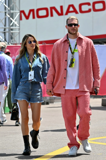 Couple walking hand-in-hand.