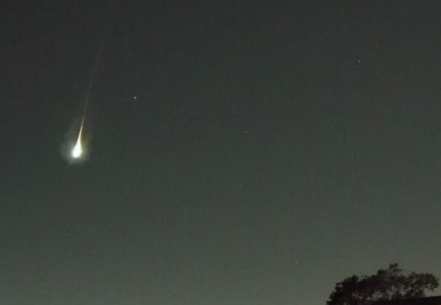 Meteor streaking across the night sky.