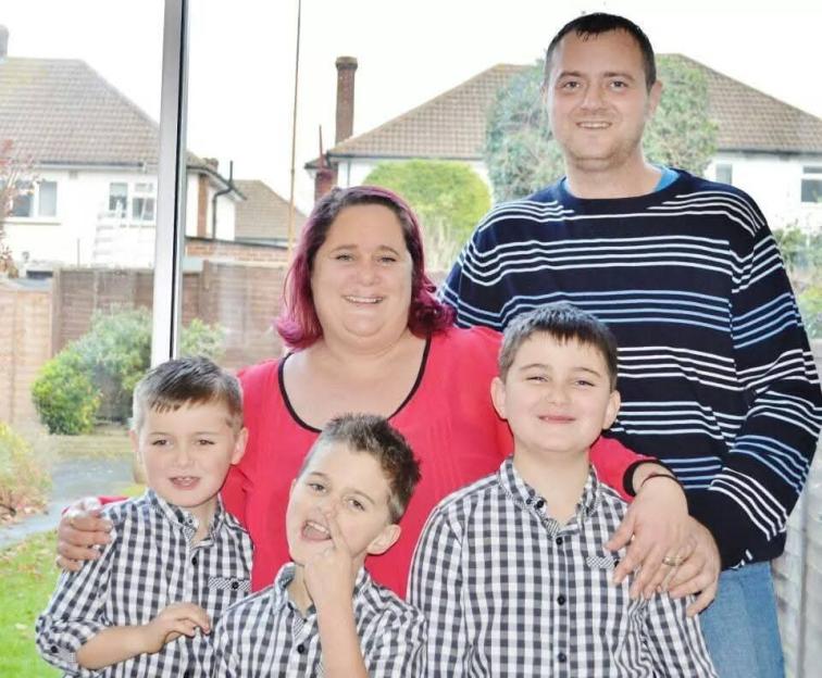 Photo of a family of five.