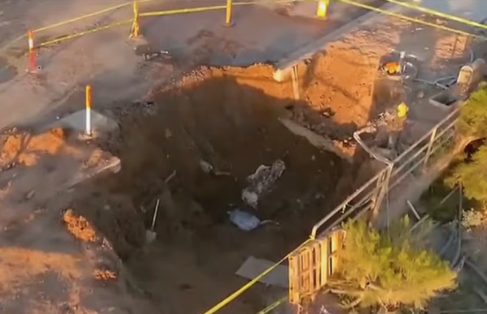 Construction worker trapped in trench collapse.