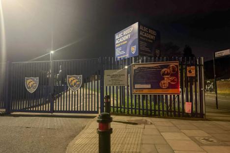 Teen girl, 17, ‘slashed in the head’ outside school in ‘unprovoked attack’ as man arrested