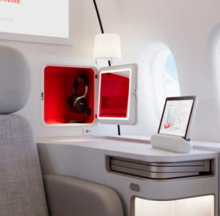 Air France's new Premier Suite features a built-in storage compartment, a mirror, and a tablet.