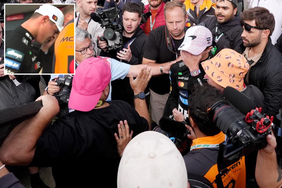 Lando Norris injured in British Grand Prix celebrations as F1 race winner walks away holding face after fence collapses