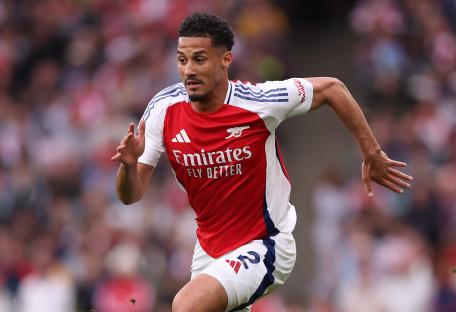 William Saliba of Arsenal running during a Premier League match.