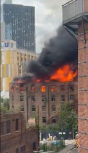Huge blaze rips through Manchester building sparking evacuations