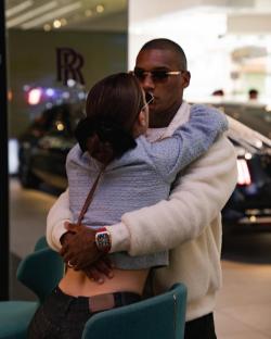 Couple embracing.