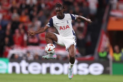 Yves Bissouma of Tottenham Hotspur controls the ball during a soccer match.