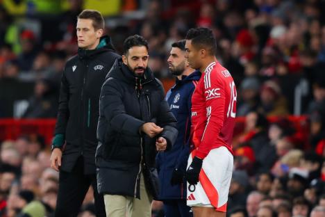 MANCHESTER, ENGLAND - NOVEMBER 28: Ruben Amorim, head coach of Manchester United, issues instructions to Casemiro of Manchester United during the UEFA Europa League 2024/25 League Phase MD5 match between Manchester United and FK Bodo/Glimt at Old Trafford on November 28, 2024 in Manchester, England. (Photo by James Gill - Danehouse/Getty Images)