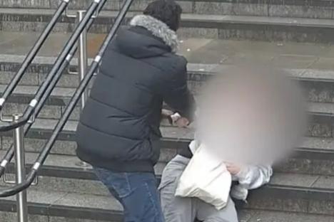 Chilling moment random creep tries to drag teen girl away from crowd in terrifying kidnap attempt at busy station