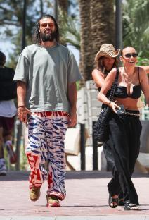 Andy Carroll and Lou Teasdale walking together in Ibiza.