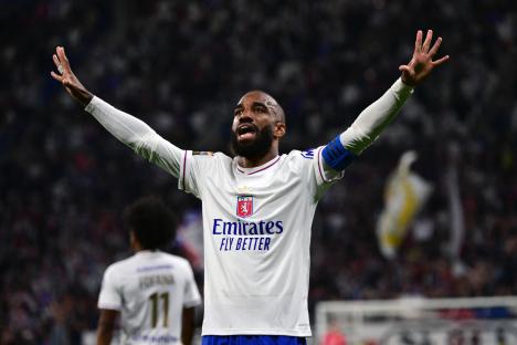 Alexandre Lacazette celebrates scoring a goal.