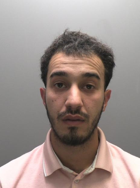 Mugshot of Adam Zawi, an asylum seeker.