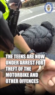 Police officers arresting teens for motorbike theft and other offenses.