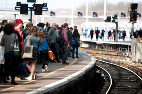 Crowded train station platform.