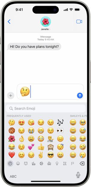 iPhone screen showing a text message and emoji keyboard.