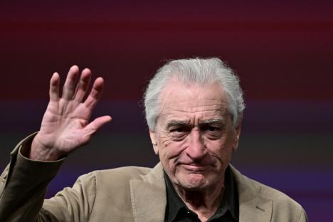 Robert De Niro waving at the Cannes Film Festival.