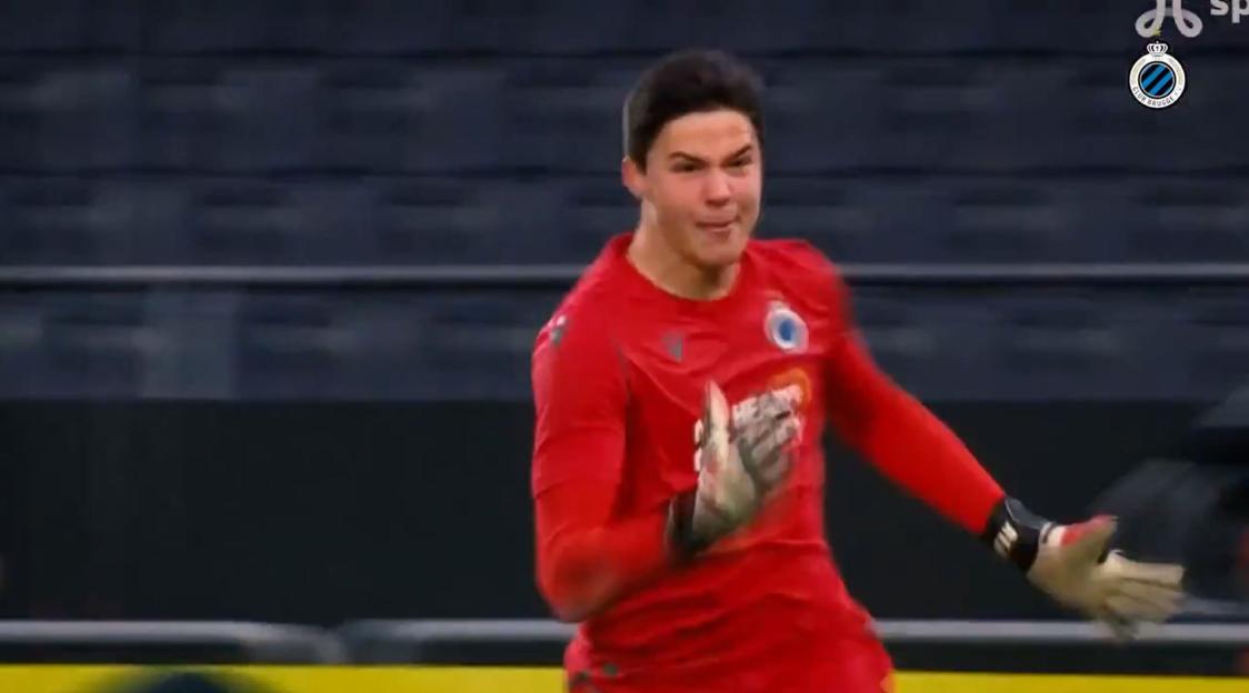Soccer goalie celebrating a goal.