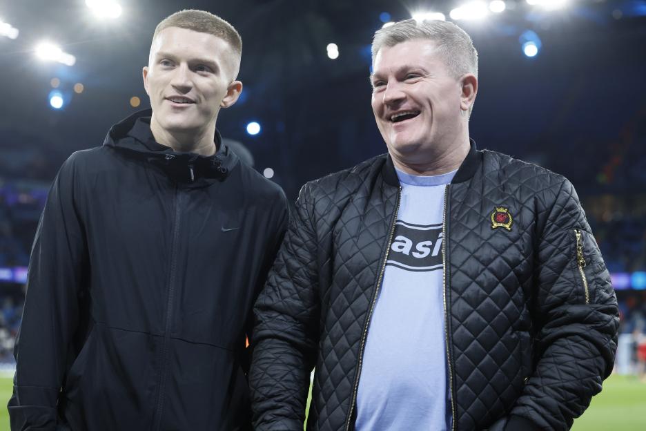 Campbell Hatton and Ricky Hatton at a soccer match.