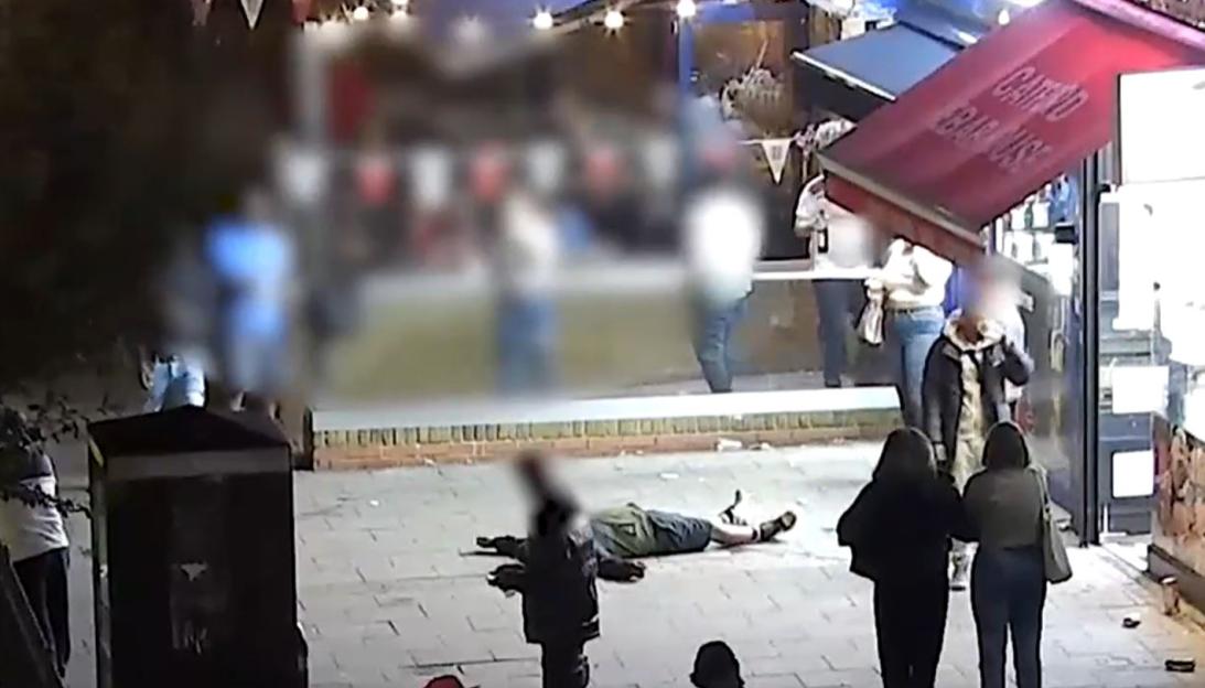 CCTV image showing Andre Gustaffe punching a victim outside the London and Rye pub in Catford, London.