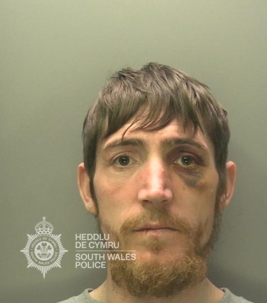 Mugshot of Matthew Battenbough with a black eye.