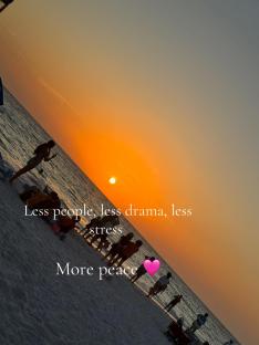 Sunset beach scene with people silhouetted against the orange sky; text overlay: