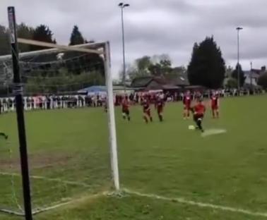 Luke Littler taking a penalty kick for Winton Yanited.
