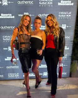 Three women at a Sports Illustrated event.