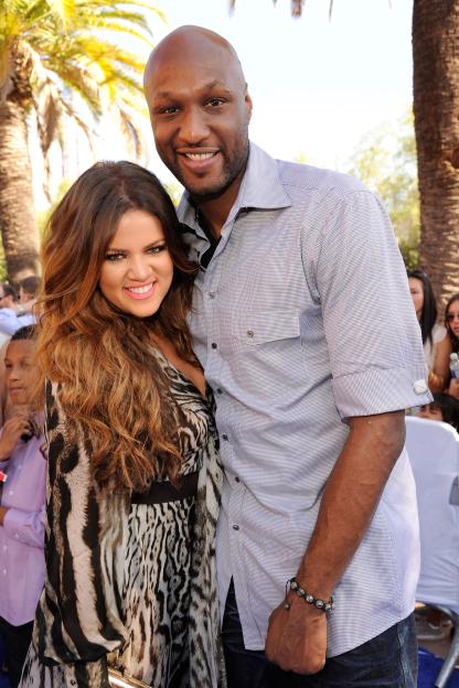 Khloe Kardashian and Lamar Odom at an event.