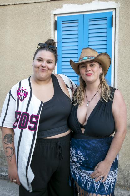 Stacey Donohoe and Anastasia Walker, an engaged couple, smiling for a photo.