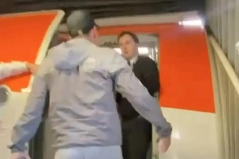 Moment EasyJet passenger screams expletive-laden abuse at flight crew before he’s SLAPPED by fuming staff